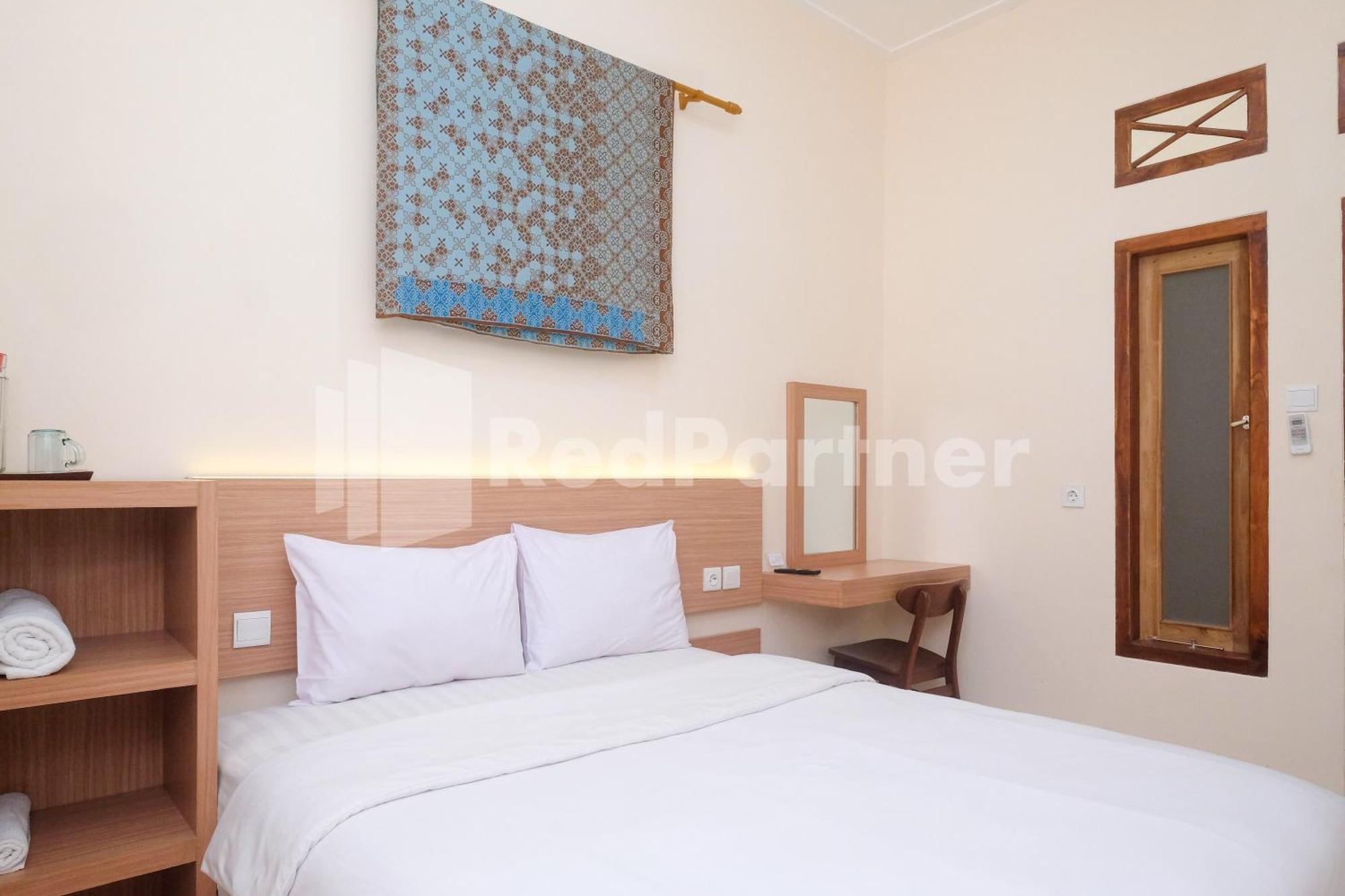 Ndliman House Near Ugm Jogja Mitra Reddoorz Hotel Kejayan Buitenkant foto