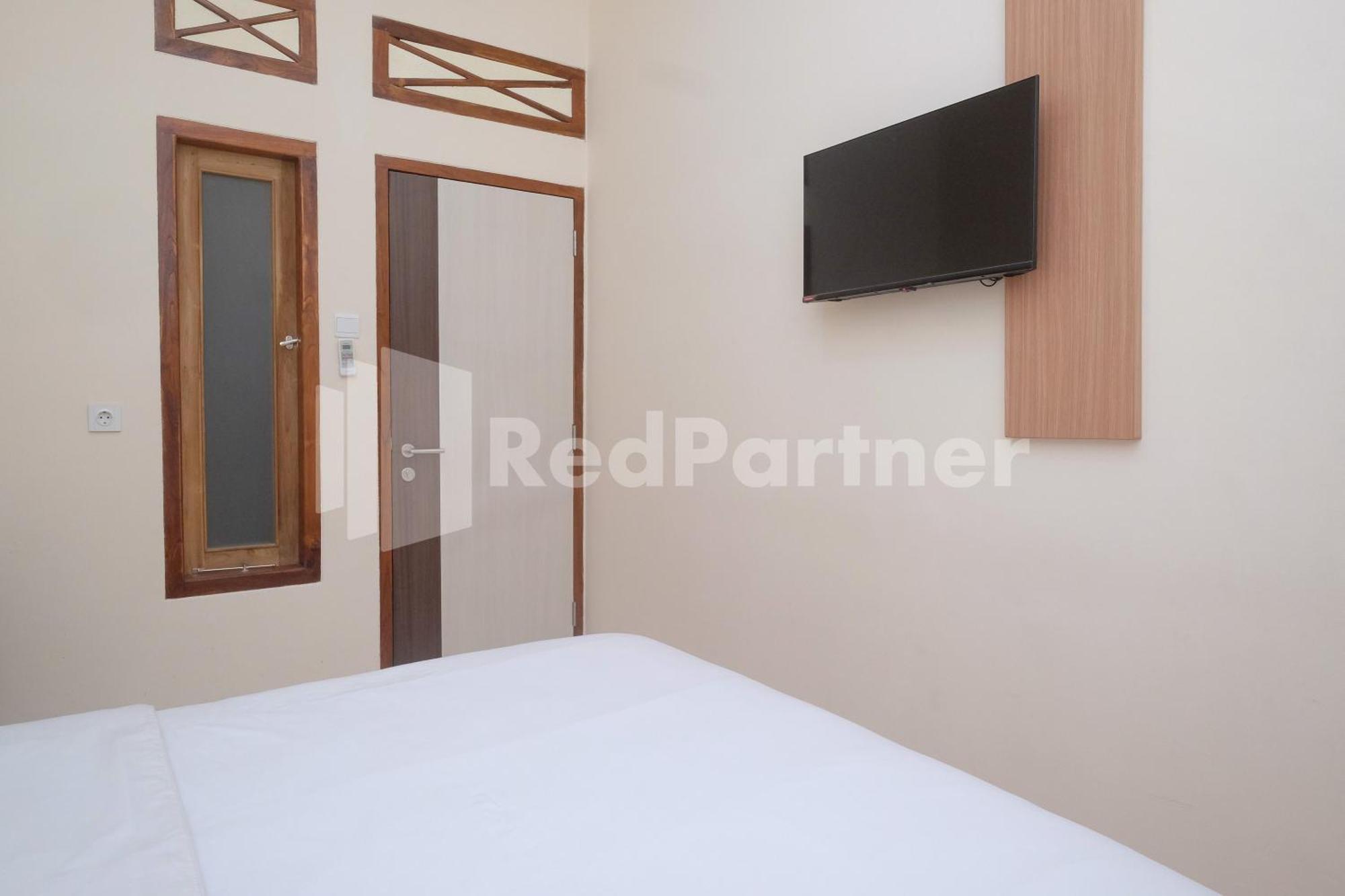 Ndliman House Near Ugm Jogja Mitra Reddoorz Hotel Kejayan Buitenkant foto